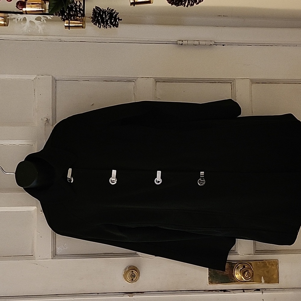 Black London Fog trench coat with chrome hardware